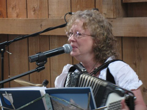 Shelby Aeppli Imholt yodels and plays the accordian